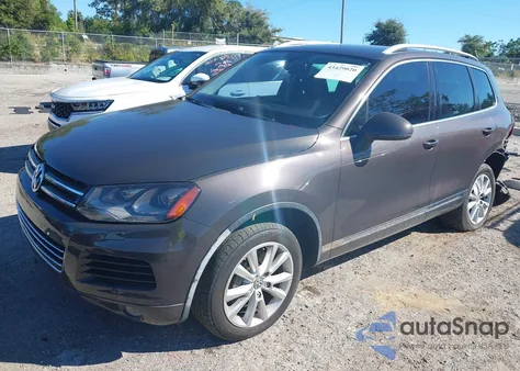 2013 Volkswagen Touareg Vr6 Sport z USA, uszkodzony, nr VIN WVGEF9BP2DD008596